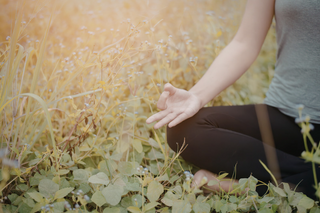 Woman releasing stress and balancing cortisol