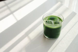 A cup of green tea in soft natural light, representing gentle daily support for metabolic health and balance